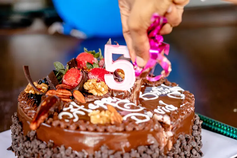 Close-up of a decorated chocolate cake for a 5th birthday celebration